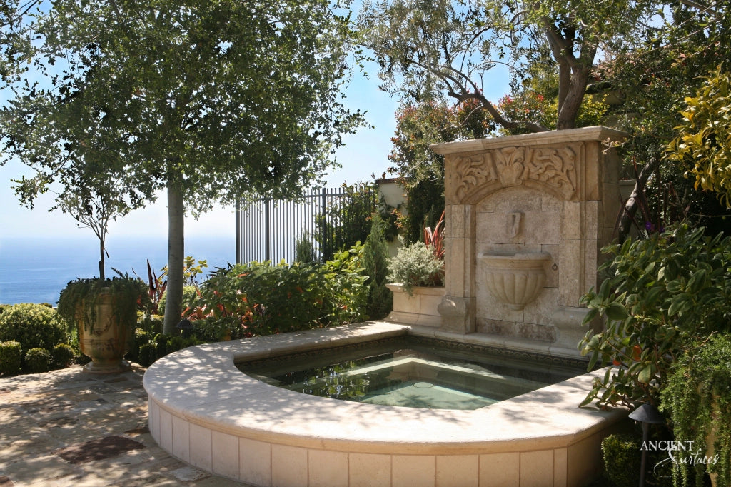 elegant-ancient-limestone-wall-fountain-with-water-gently-cascading-embodying-a-harmonious-blend-of-design-and-tradition