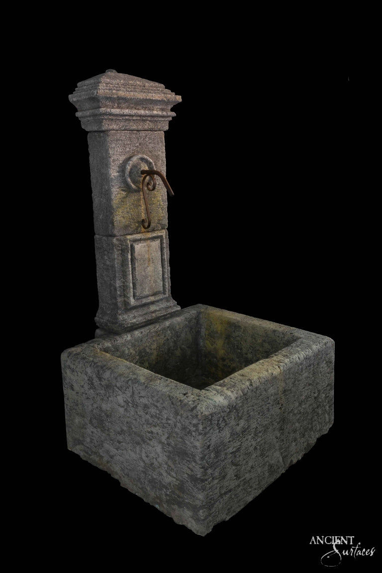 Rustic Charm: Classic Limestone Water Spout