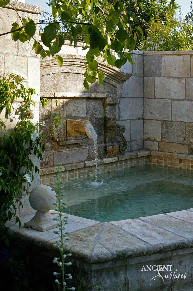 Serene Oasis: Limestone Wall Fountain with Pool