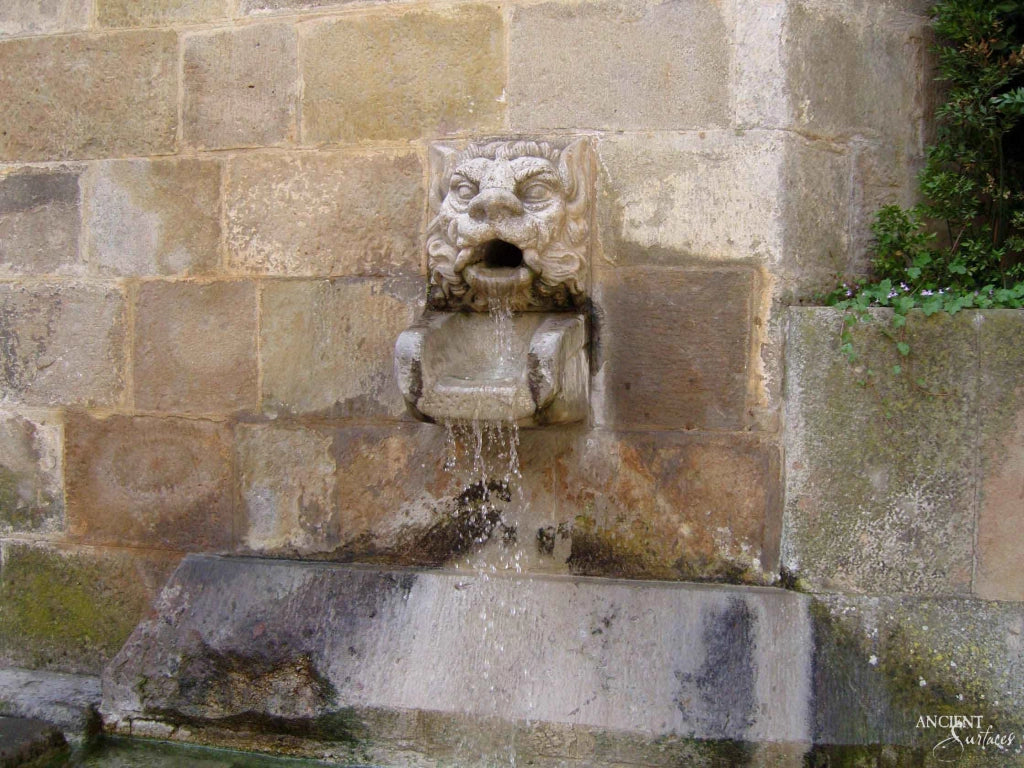antique_limestone_wall_fountains_timeless_harmony_ancient_surfaces_lion-wall-fountain